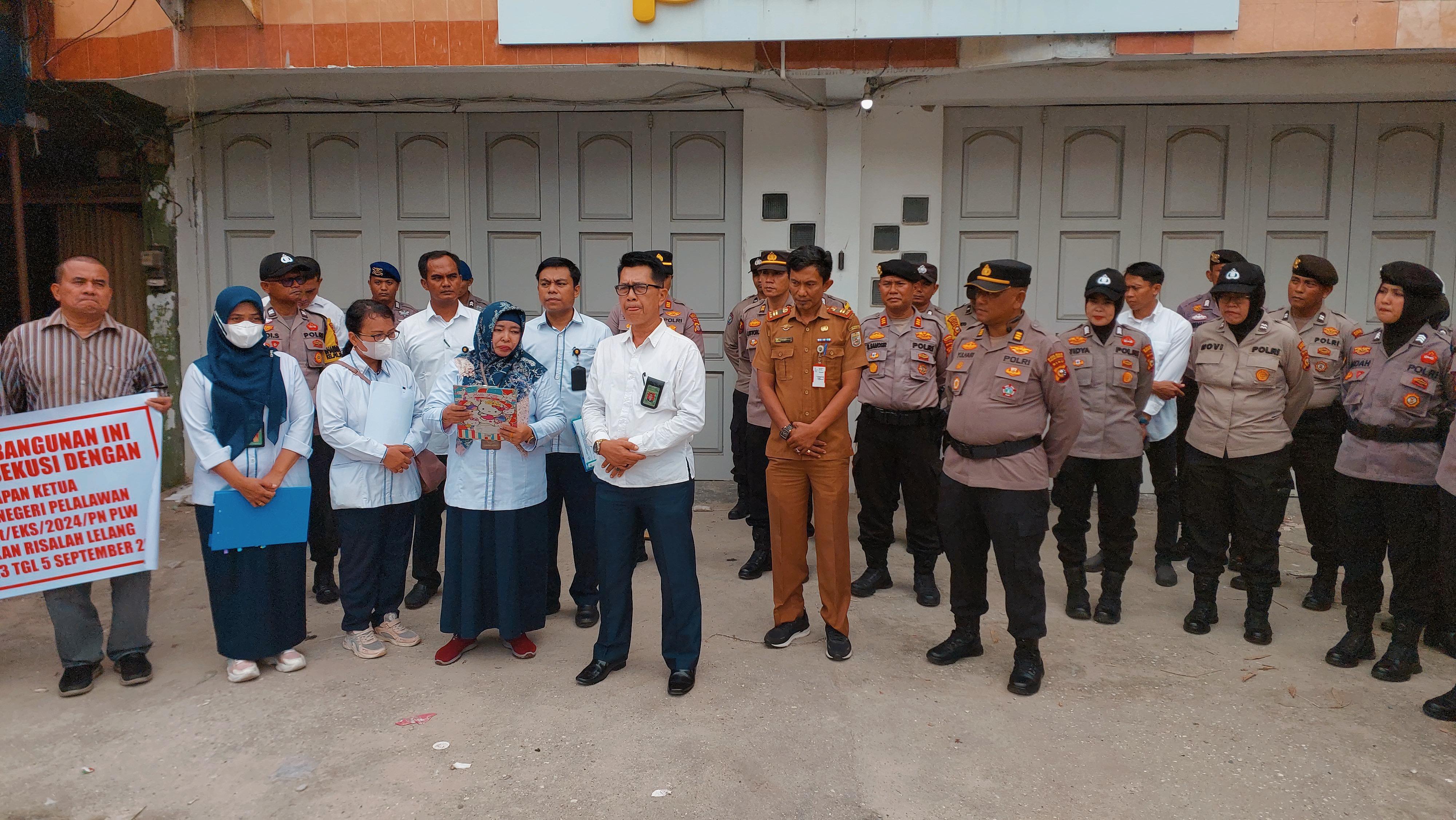Berjalan Damai, PN Pelalawan Berhasil Eksekusi Tanah dan Bangunan